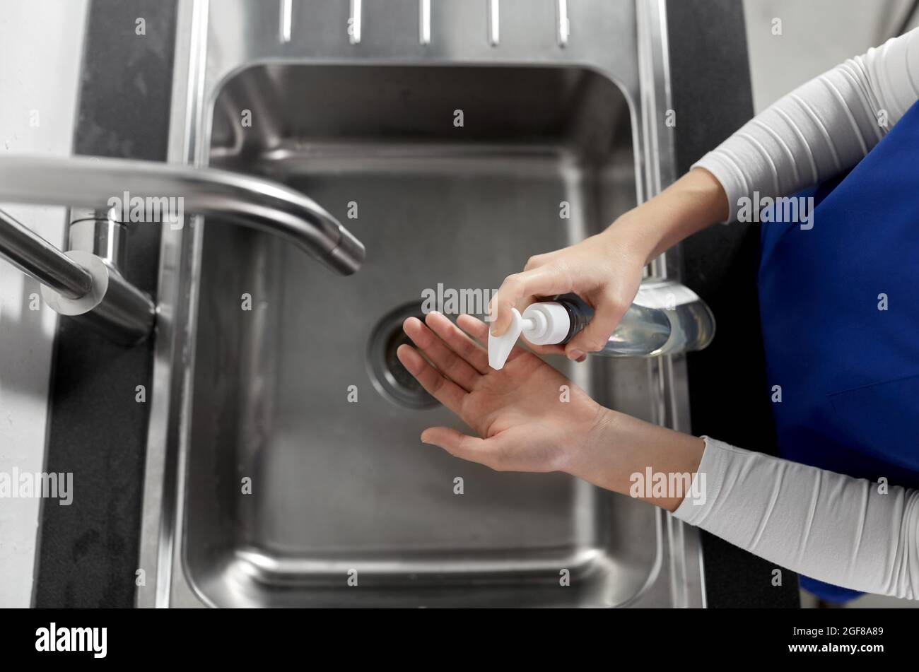 doctor or nurse washing hands with liquid soap Stock Photo - Alamy