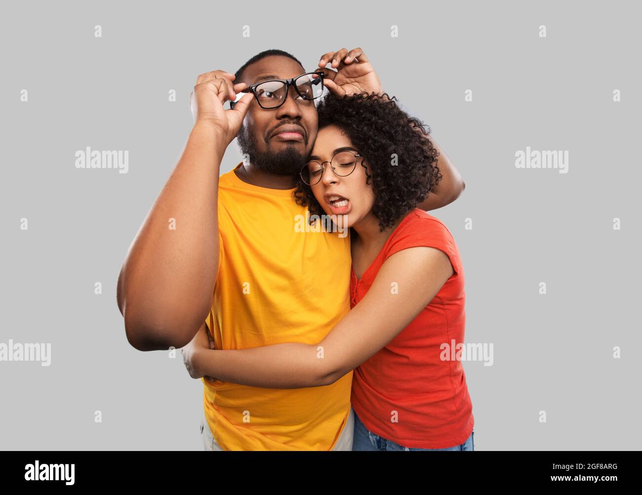 happy african american couple in glasses hugging Stock Photo - Alamy