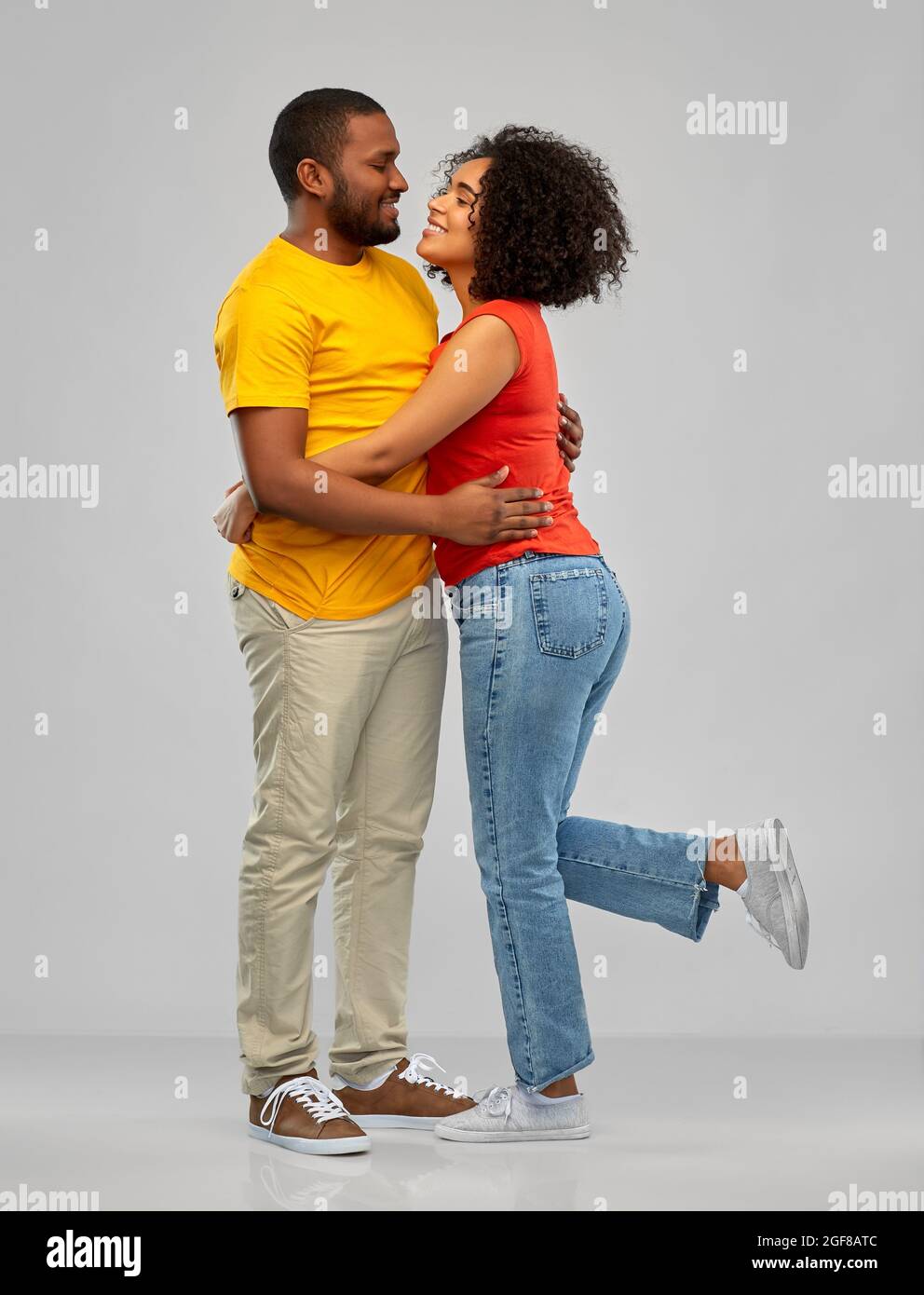 happy african american couple hugging Stock Photo - Alamy