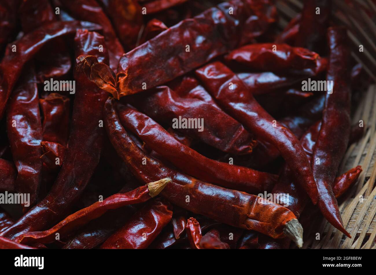 Dry red chili pepper in the bamboo basket Stock Photo - Alamy