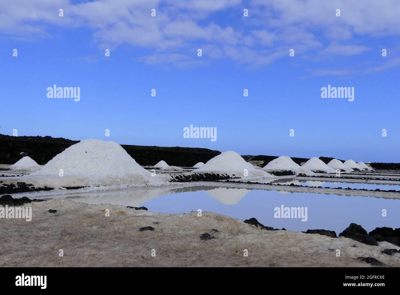 Salt production from sea water Stock Photo