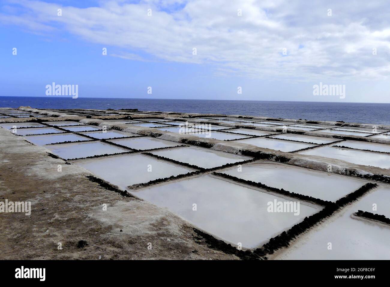 Salt production from sea water Stock Photo