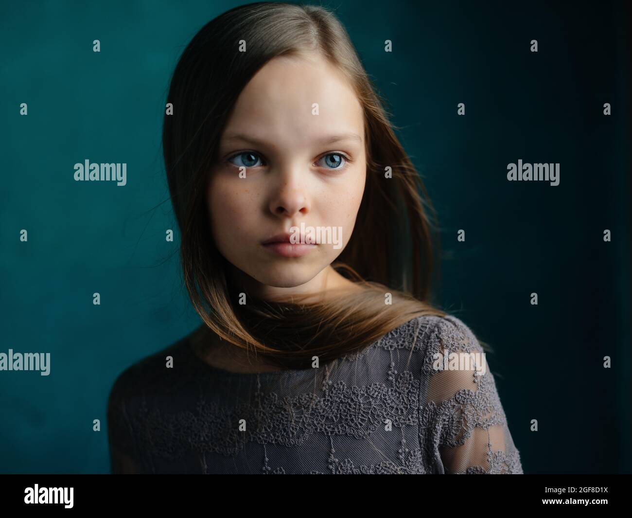 cute girl long hair studio cropped view Stock Photo - Alamy
