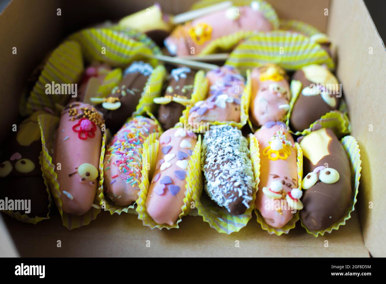 halves bananas in chocolate decorated Stock Photo