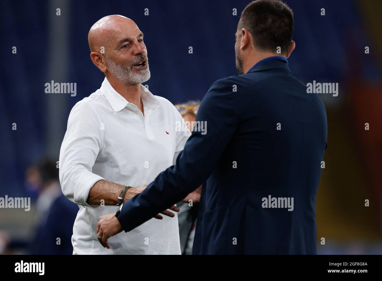 Stefano Pioli (AC Milan) greets Roberto Dâ&#x80;&#x99;Aversa (U.C. Sampdoria)  during  UC Sampdoria vs AC Milan, Italian football Serie A match in Genova, Italy, August 23 2021 Stock Photo