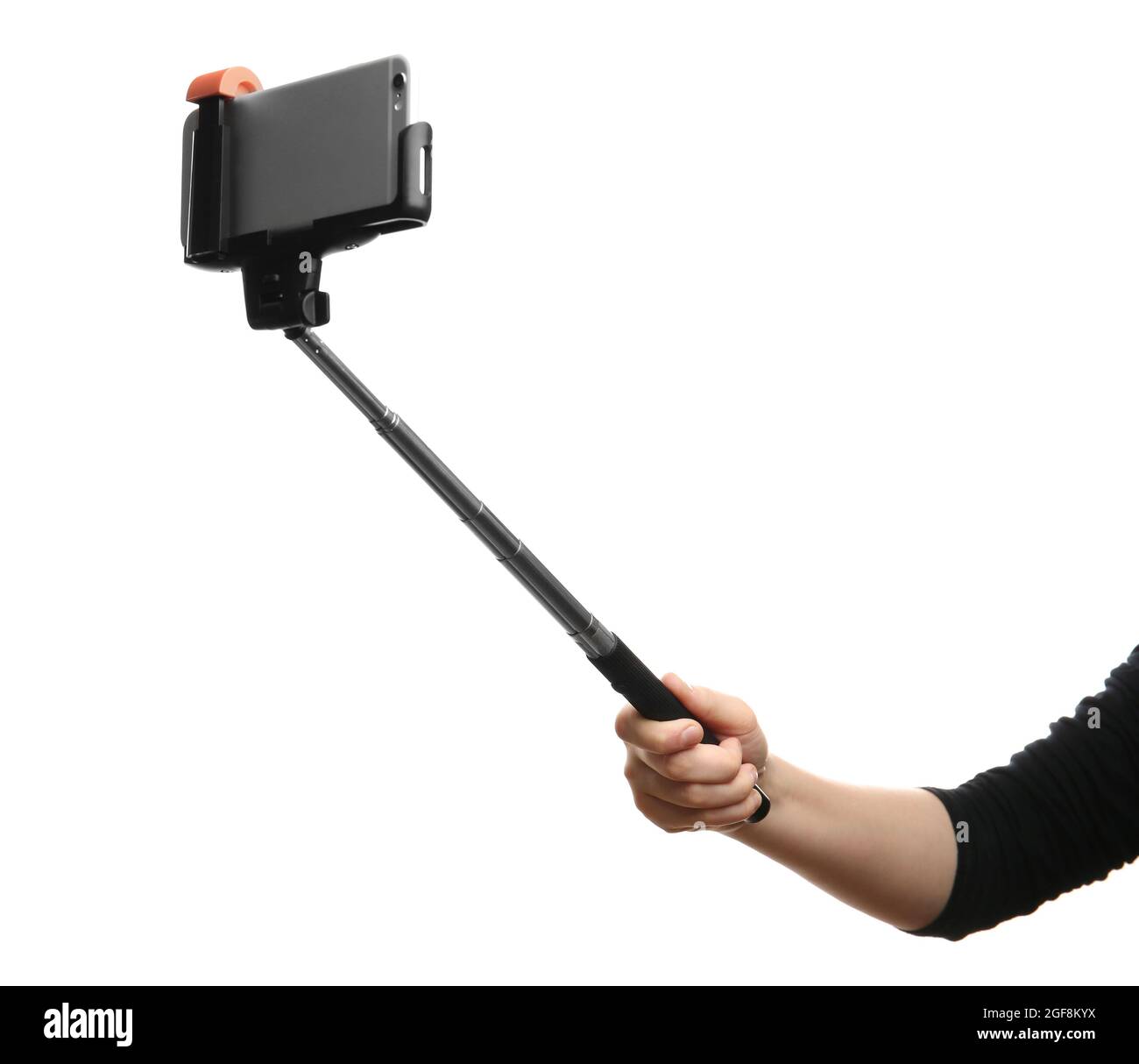 Hand holding stick for making photo with mobile phone, isolated on white  Stock Photo - Alamy