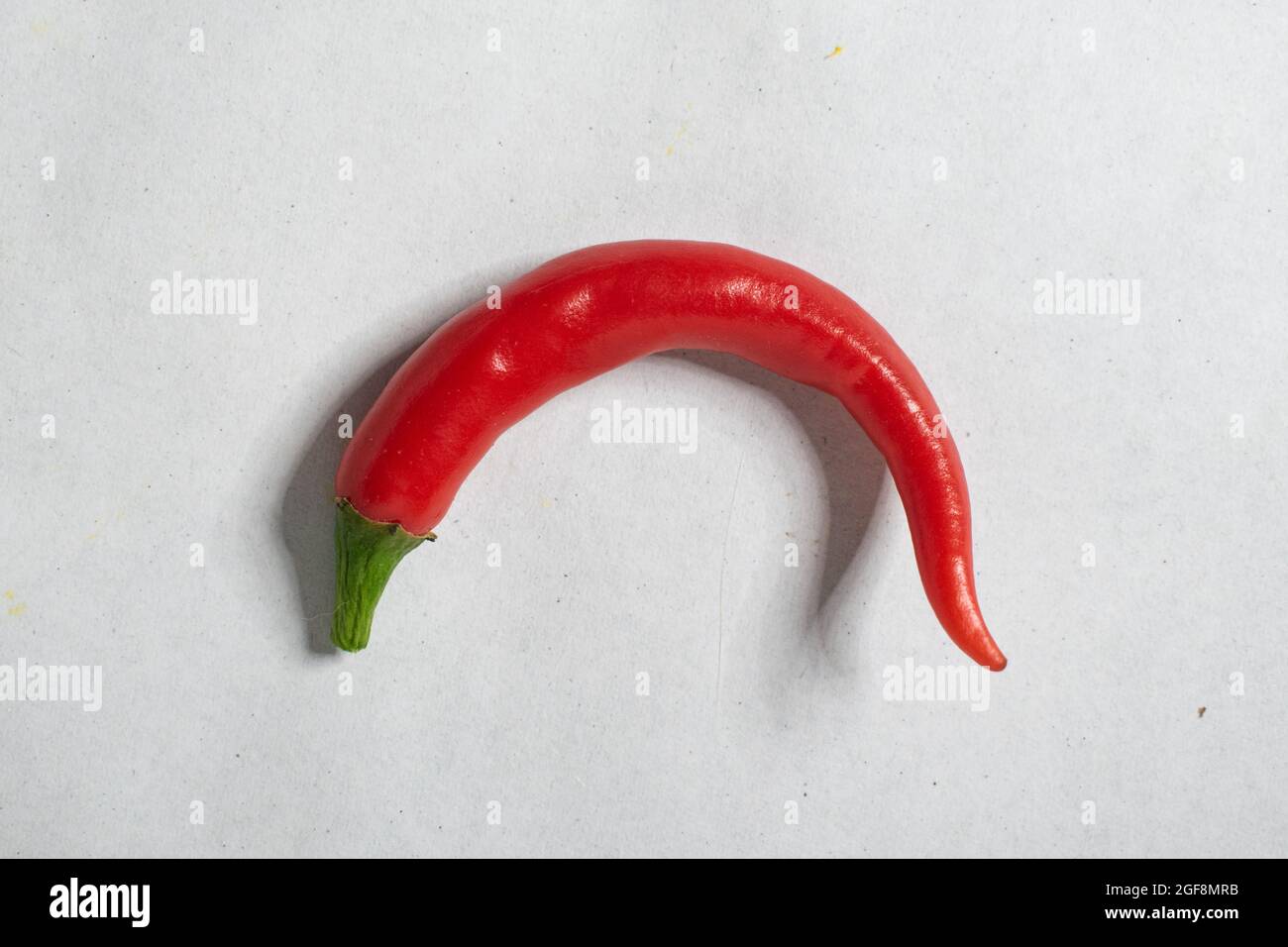 Closeup of red chili pepper on white background Stock Photo - Alamy