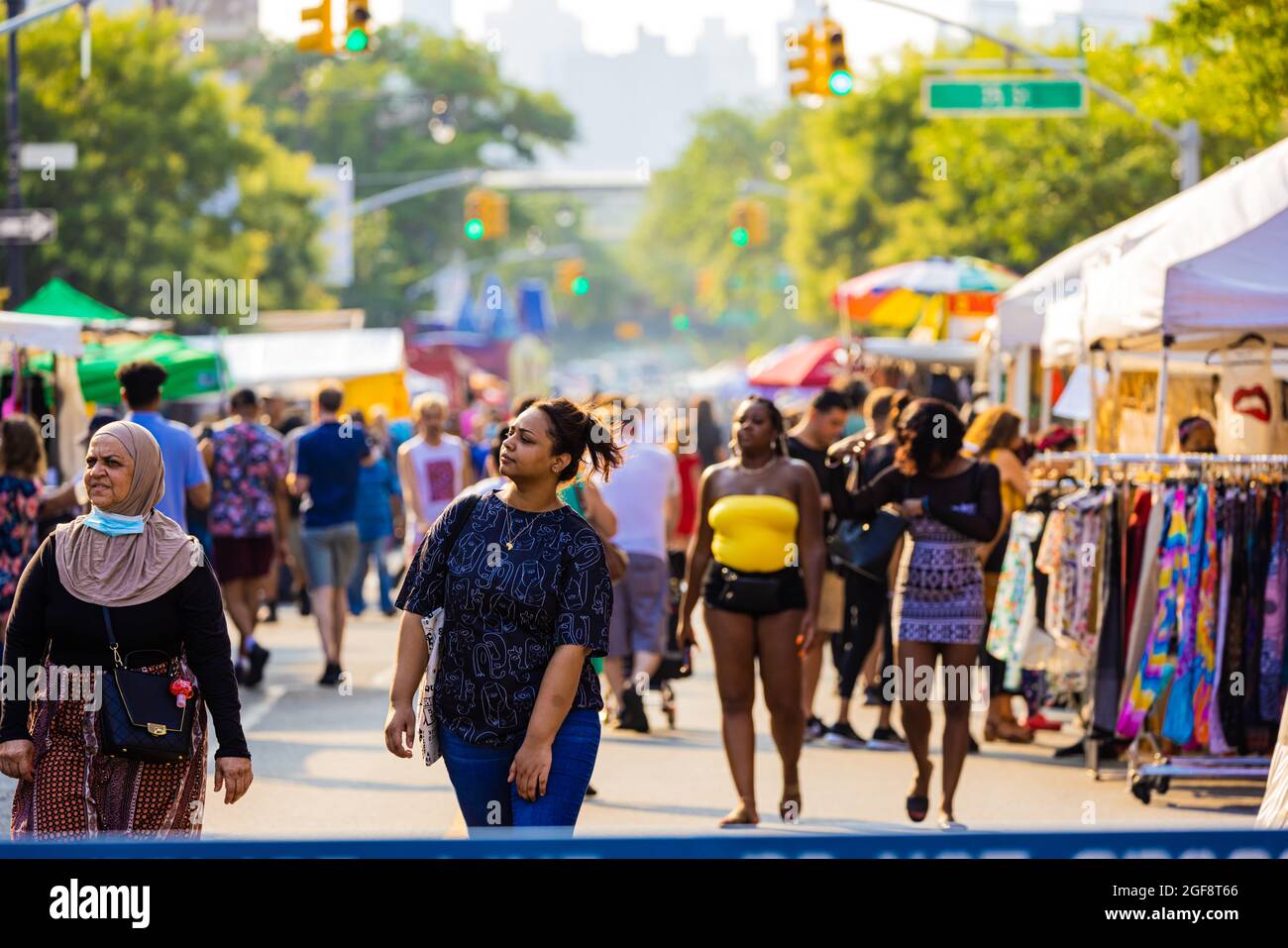 QUEENS, UNITED STATES - Jul 26, 2021: The people walking at the Astoria