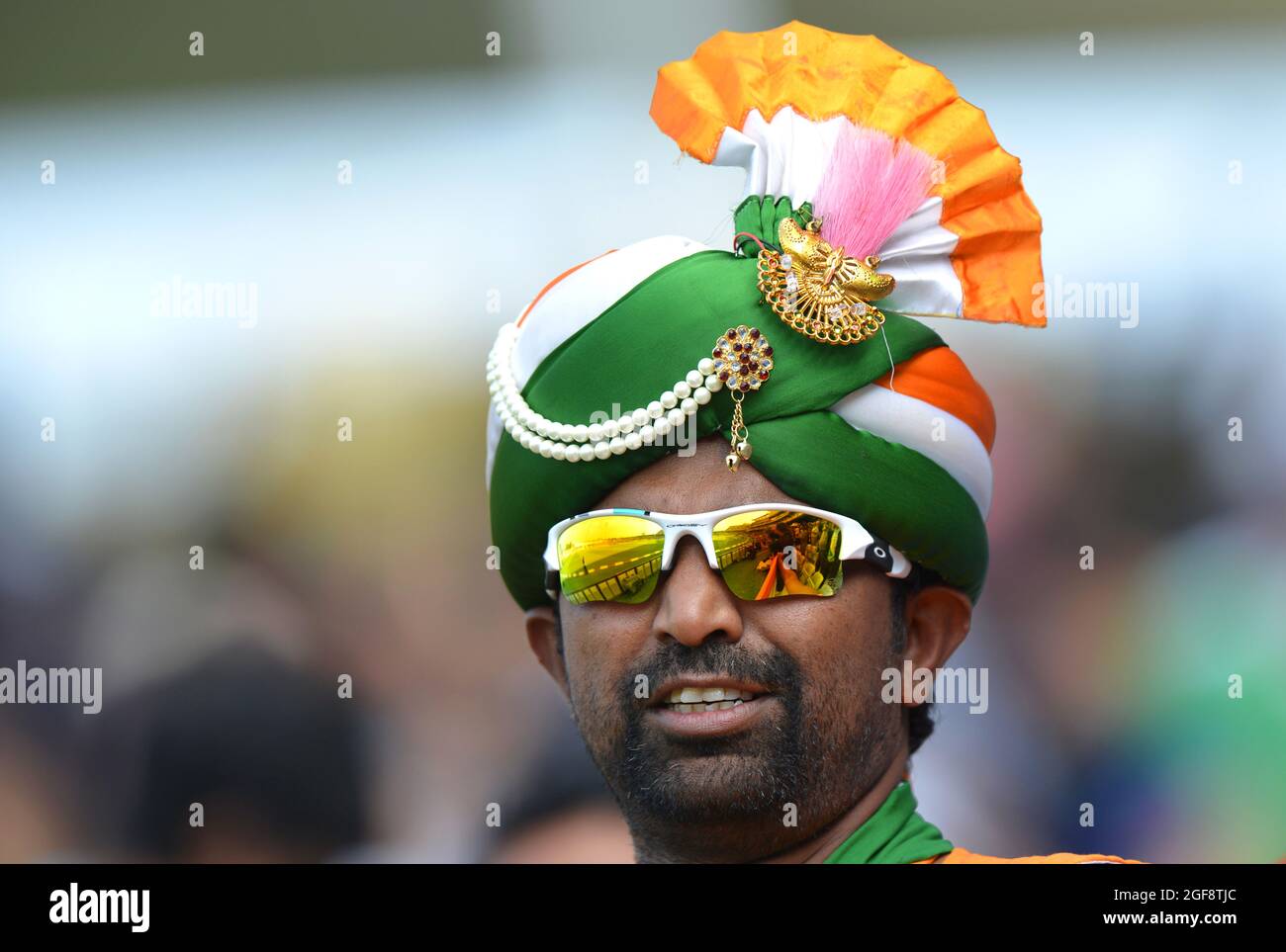Cricket fan of India wearing turban with the national flag of India colours One Day International - ODI - England v India 2014 Stock Photo