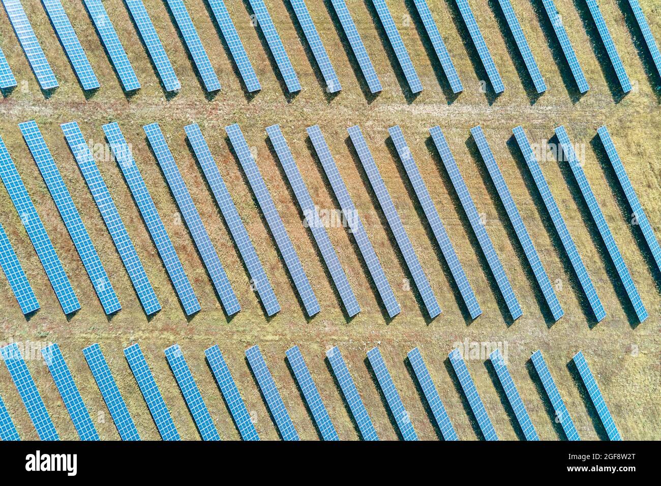 Row of solar panels in the field. Solar battery farm, aerial view ...