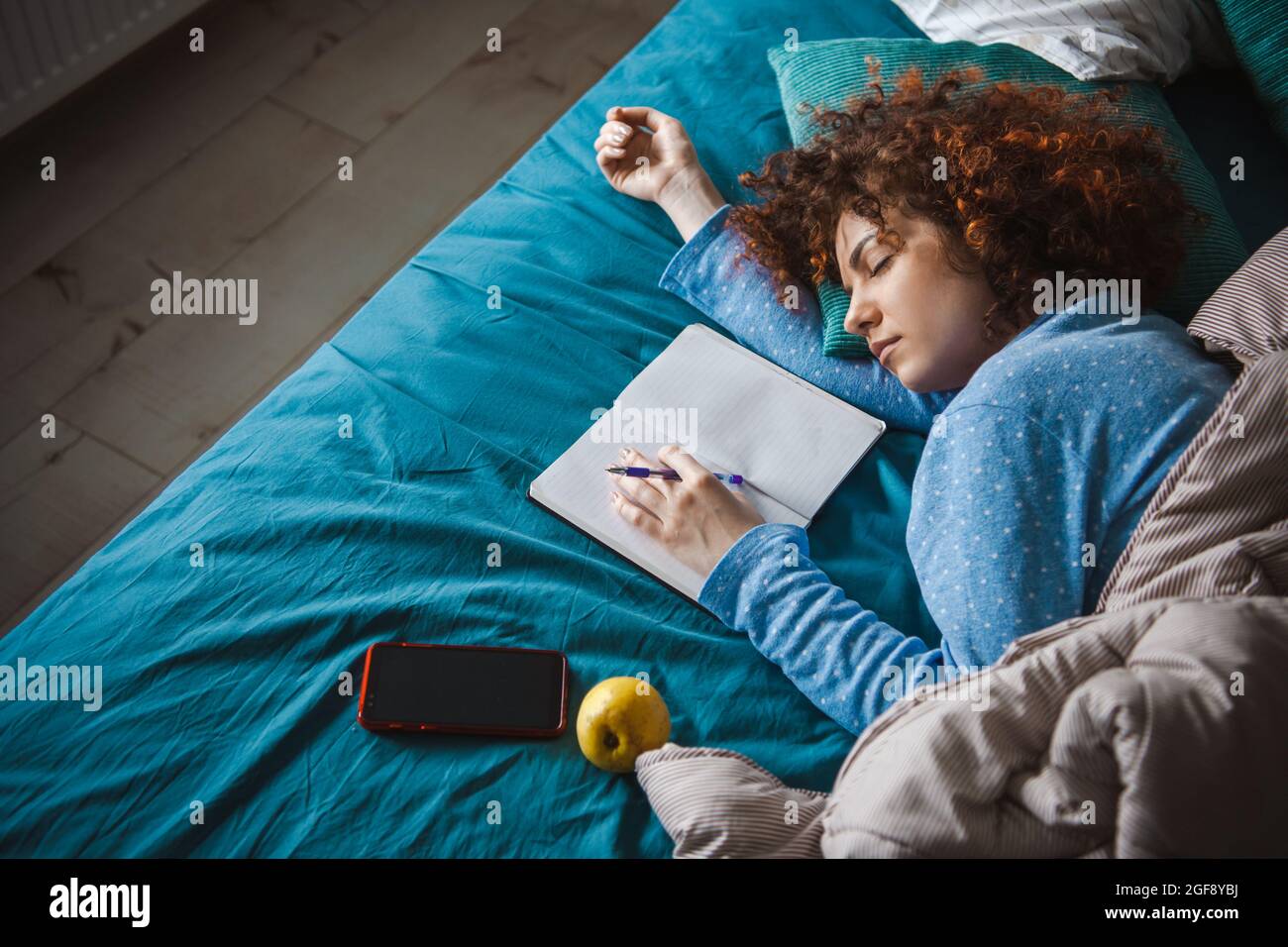 Tired Pyjamas Woman sleeping. Modern woman lifestyle. Tired woman sleeping in pajamas ...