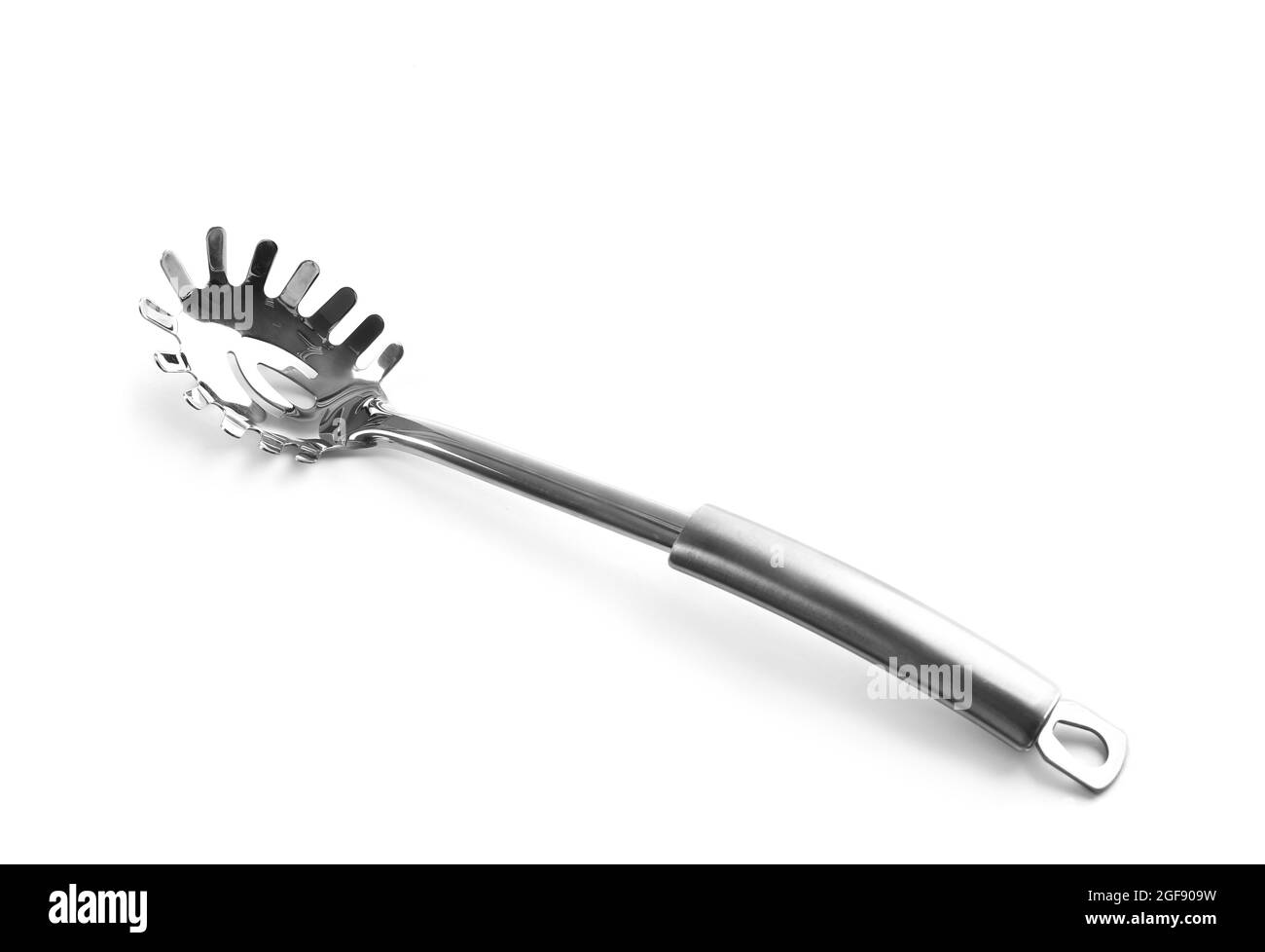 Silver spaghetti spoon, isolated on white Stock Photo Alamy