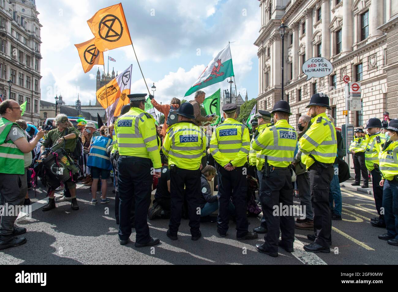 London, UK. 24th Aug, 2021. Police seen as Extinction Rebellion XR Cymru Action holds a protest against climate change, global warming, which plans to target the root cause of the climate and ecological crisis and to demand the government divest from fossil fuel companies. (Photo by Dave Rushen/SOPA Images/Sipa USA) Credit: Sipa USA/Alamy Live News Stock Photo