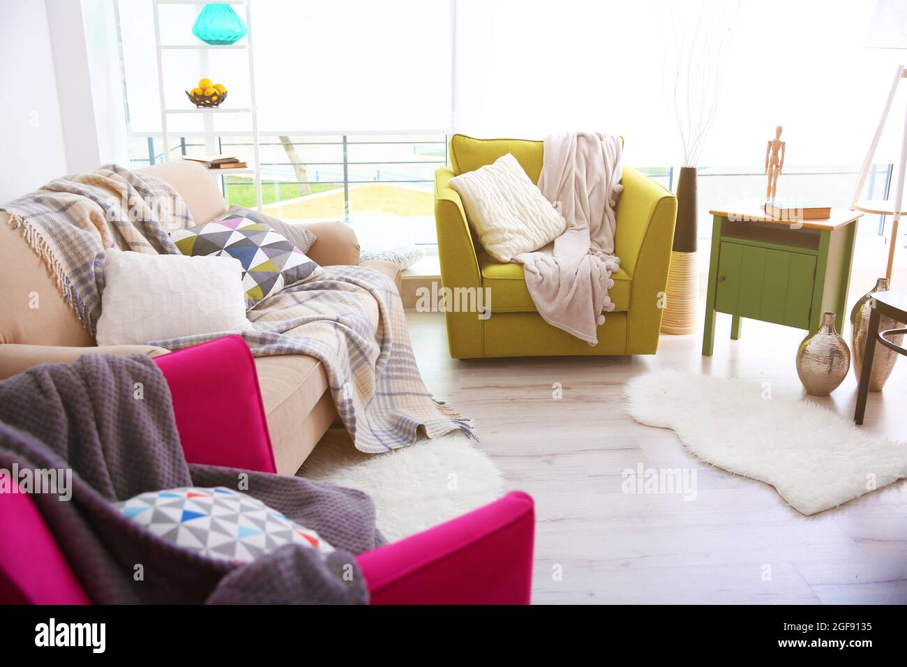 Modern living room design with sofa and armchairs Stock Photo - Alamy