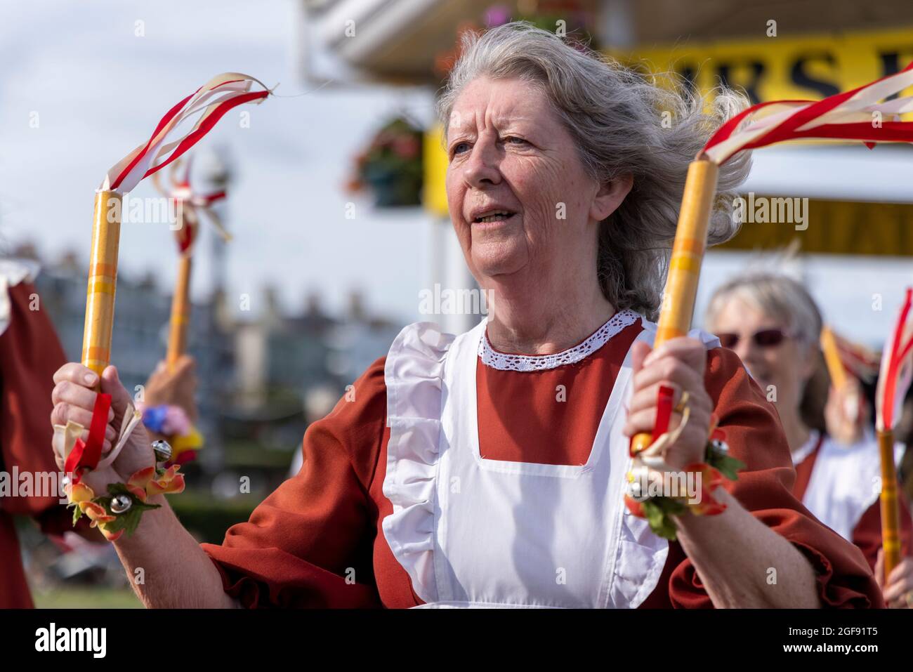 A group of women clog dancers performing at the bandstand during Broadstairs Folk Week, August 2021 Stock Photo