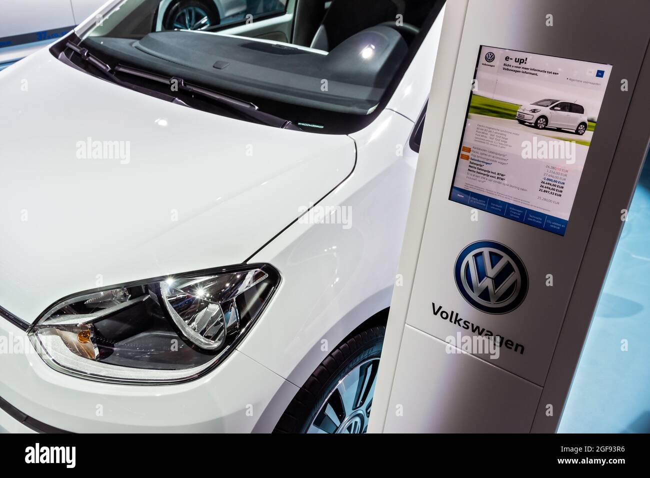 Volkswagen e-up electric car information at the Brussels Expo Autosalon motor show. Belgium - January 12, 2016 Stock Photo