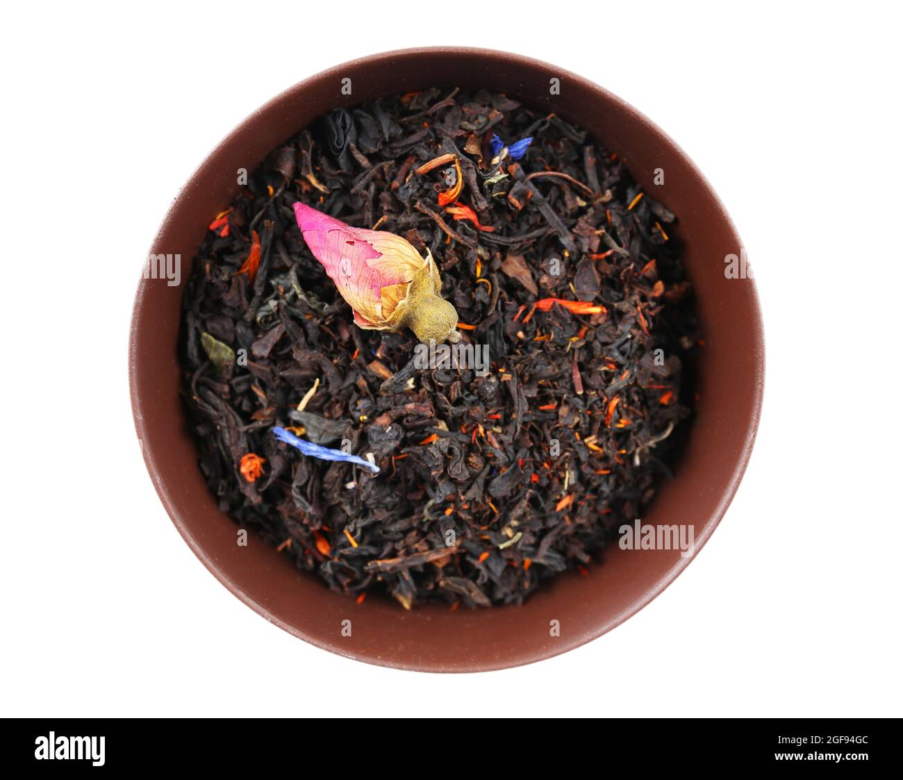 Dry tea in saucer isolated on white Stock Photo Alamy
