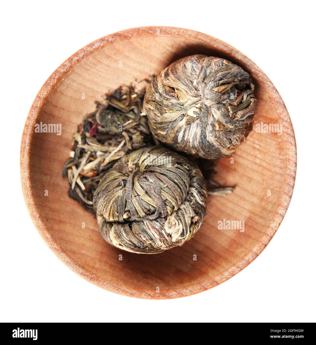 Dry tea in saucer isolated on white Stock Photo Alamy