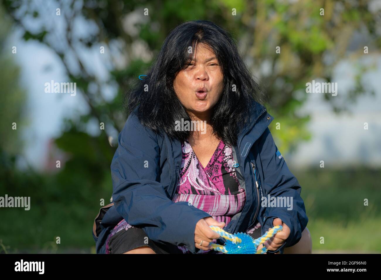 60s woman asian hi-res stock photography and images - Alamy