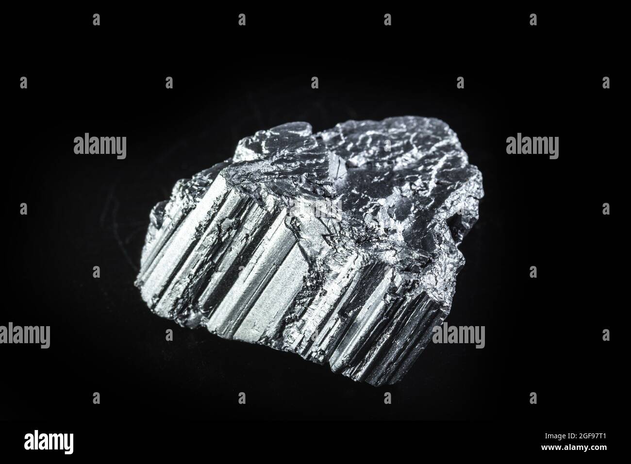 neodymium stone, part of the rare earth group, the world's strongest magnetic ore used in the technology industry Stock Photo