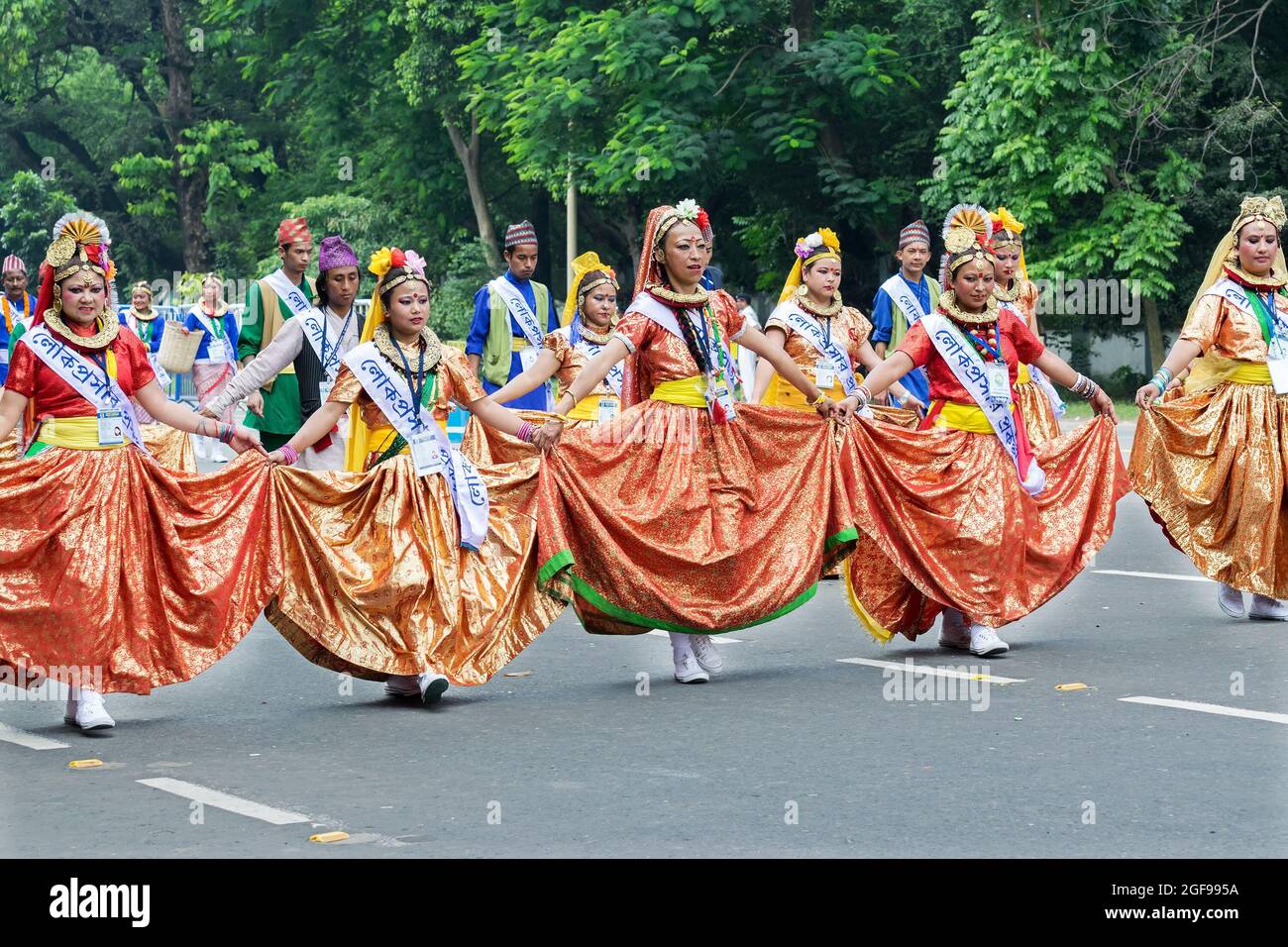 KOLKATA, WEST BENGAL / INDIA AUGUST 15TH, 2016 Female folk dancers marching past in India's