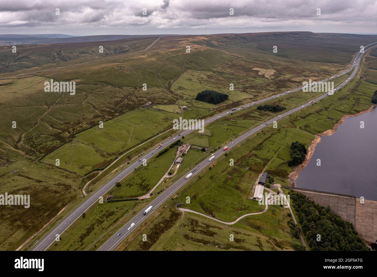 Rishworth Moor Motorway Ainley Top M62 Stott Hall Farm Aerial Birds Eye View The House in the Middle of the road  the M62 motorway was built around Stock Photo