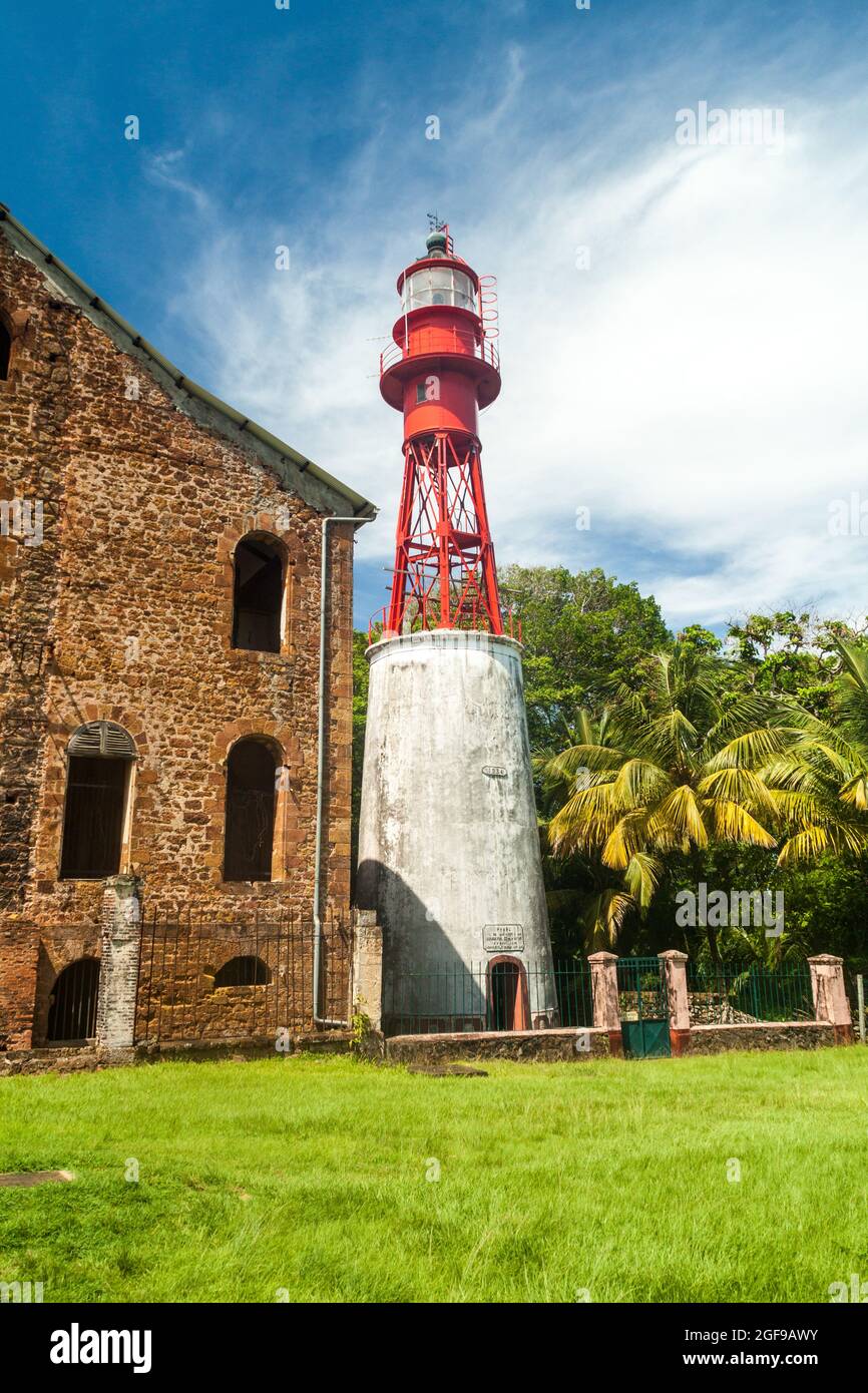 Lighthouse at a former penal colony at Ile Royale, one of the islands of Iles du Salut (Islands of Salvation) in French Guiana Stock Photo