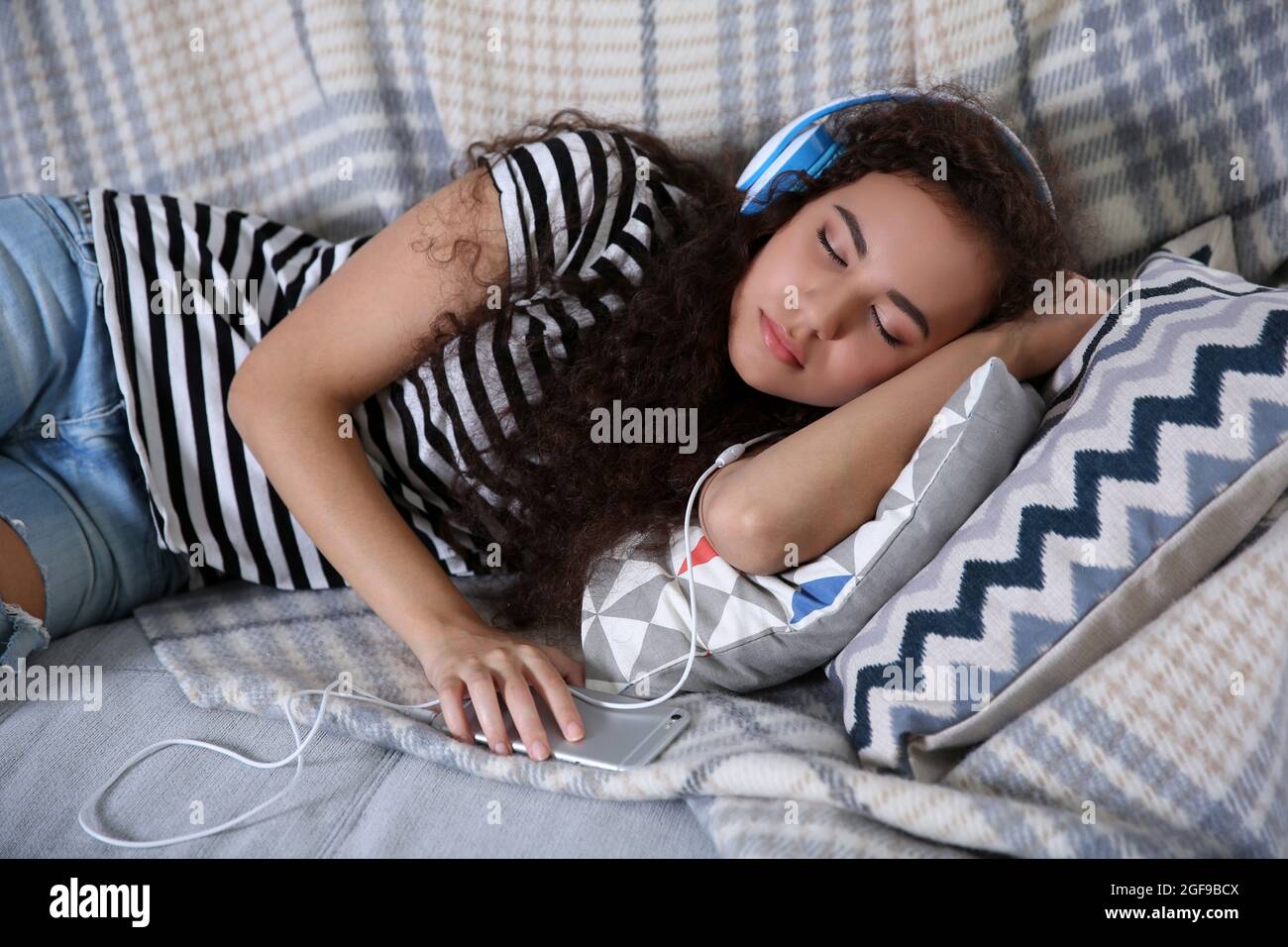 Beautiful girl sleeping on couch Stock Photo Alamy