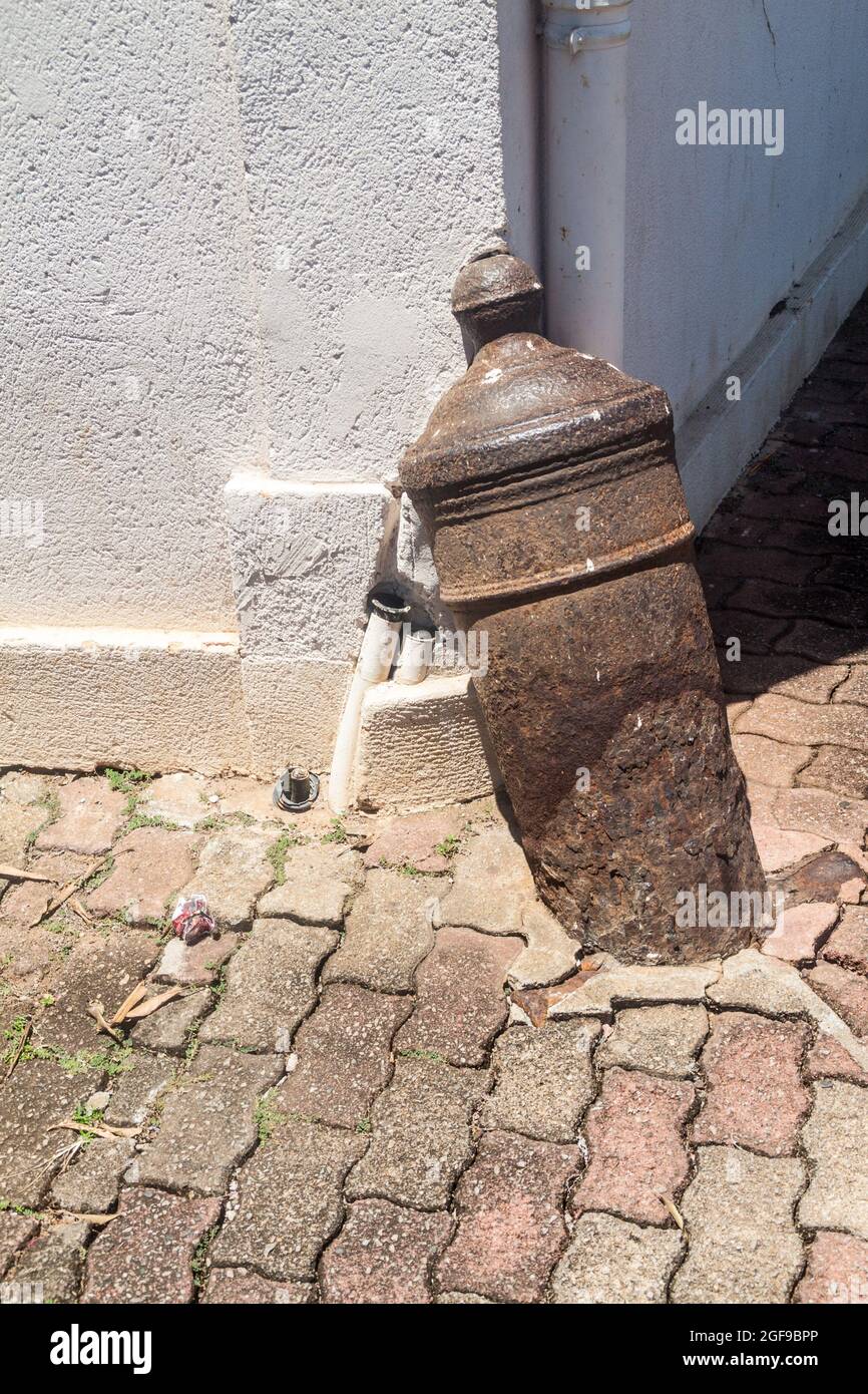 Spur stone of a building made of an old cannon in Cayenne, capital of French Guiana. Stock Photo