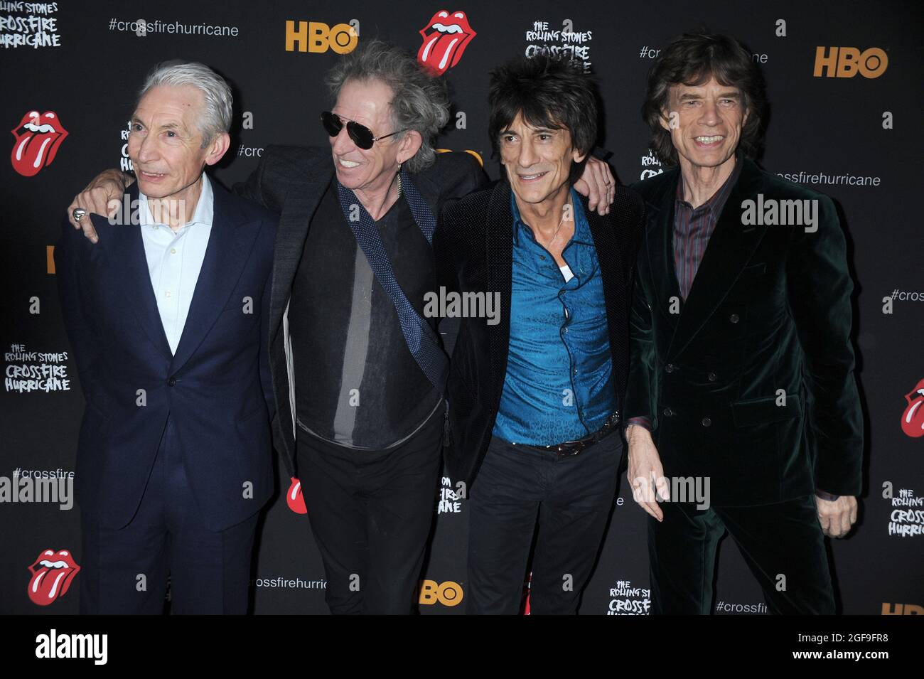 **FILE PHOTO** Charlie Watts Has Passed Away . NEW YORK, NY - NOVEMBER 13: Charlie Watts, Keith Richards, Ronnie Wood and Mick Jagger of The Rolling Stones at 'The Rolling Stones Crossfire Hurricane' Premiere at Ziegfeld Theater on November 13, 2012 in New York City. Credit mpi01/MediaPunch Inc. Stock Photo