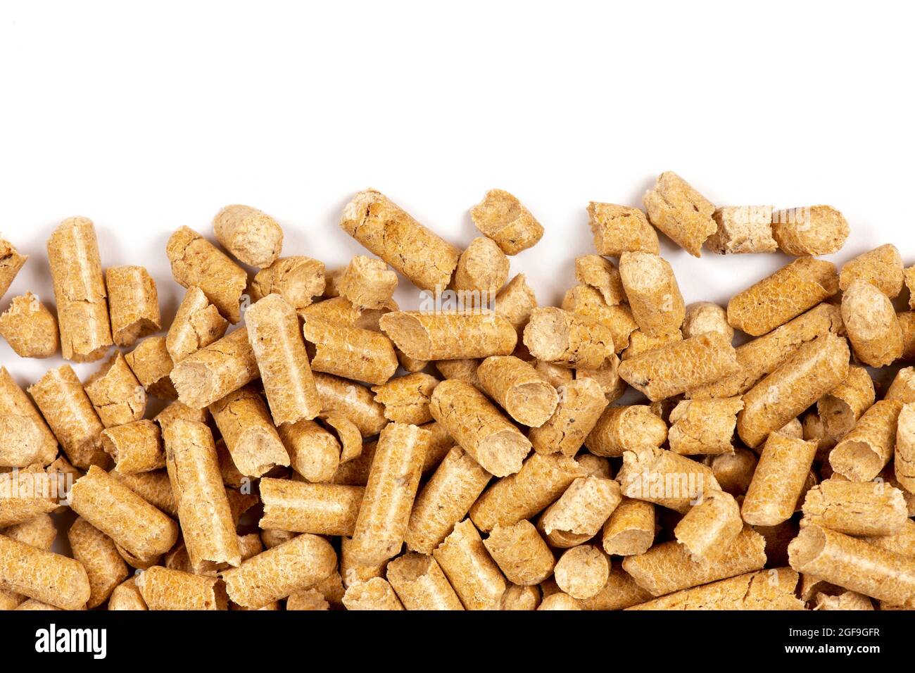 Wood pellets on white background. Biofuel Stock Photo