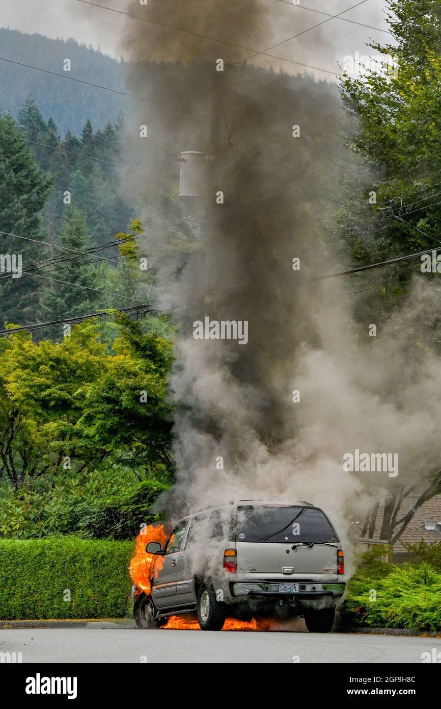 GMC Yukon SUV on fire, District of North Vancouver, British Columbia, Canada Stock Photo