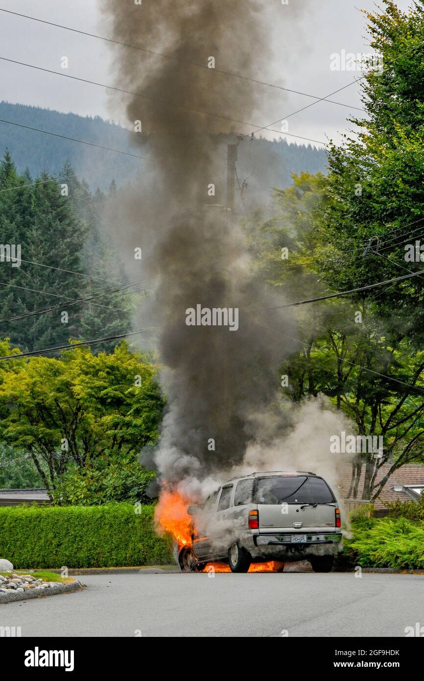 GMC Yukon SUV on fire, District of North Vancouver, British Columbia, Canada Stock Photo