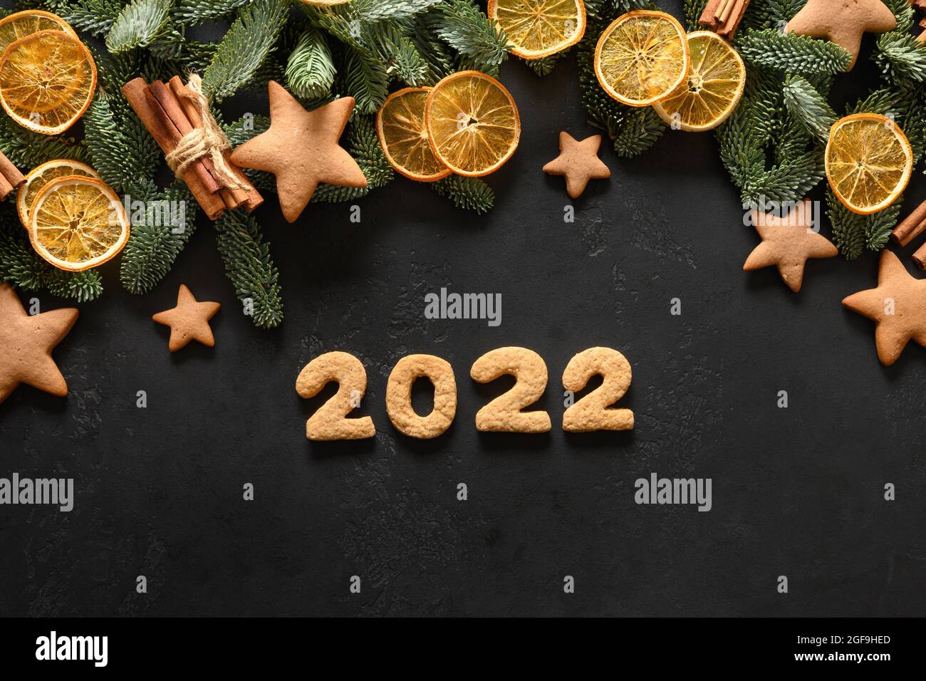 Christmas Dates 2022 Christmas Holidays Glazed Cookies, Date 2022 , Orange Chips, Nobilis  Branches As Frame On A Black Background. Happy New Year. View From Above.  Flat La Stock Photo - Alamy