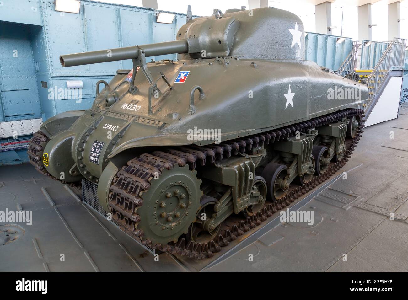 08-24-2021 Portsmouth, Hampshire, UK, A sherman tank on the deck of a D-Day Landing craft, LCT 7074 at the D-Day story Museum in Southsea Stock Photo