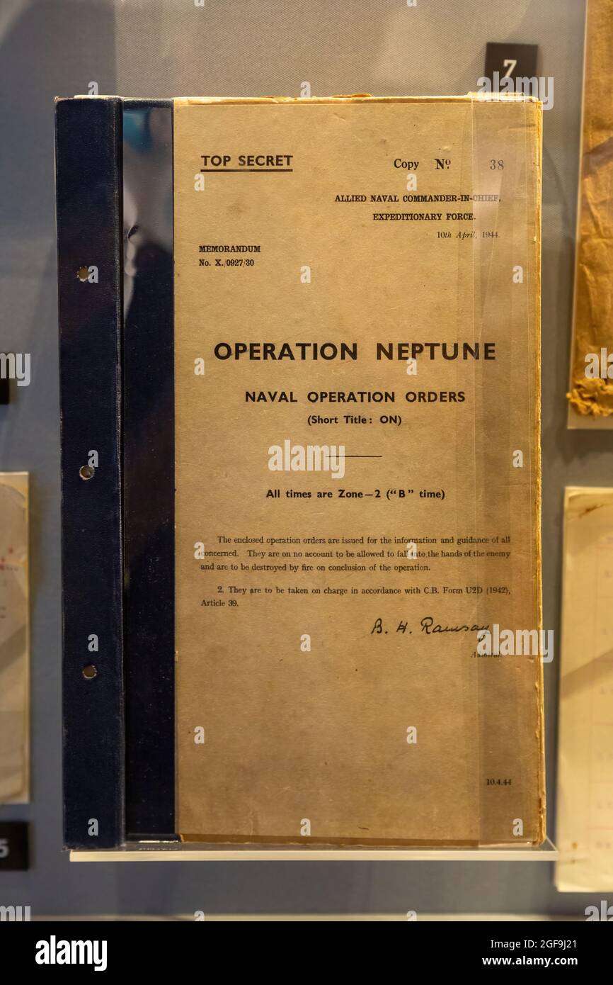 08-24-2021 Portsmouth, Hampshire, UK, A log book with the plans to Operation neptune on show in a museum, The D-Day story museum, Southsea Stock Photo