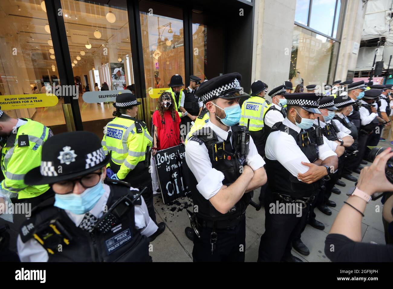 Security personnel at the Louis Vuitton boutique inside Selfridges London  ahead of the opening of the winter sales Stock Photo - Alamy