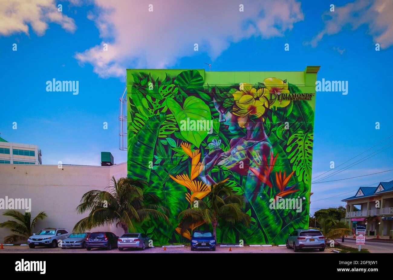 Grand Cayman, Cayman Islands, July 2020, view of a mural by a parking lot advertising Diamonds International store in George town Stock Photo