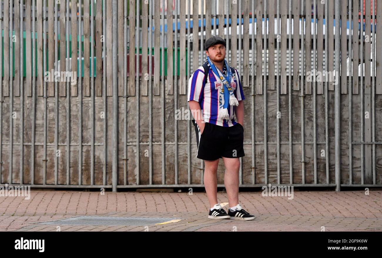 Huddersfield Town fan ahead of the Carabao Cup second round match at John Smiths' Stadium, Huddersfield. Picture date: Tuesday August 24, 2021. Stock Photo