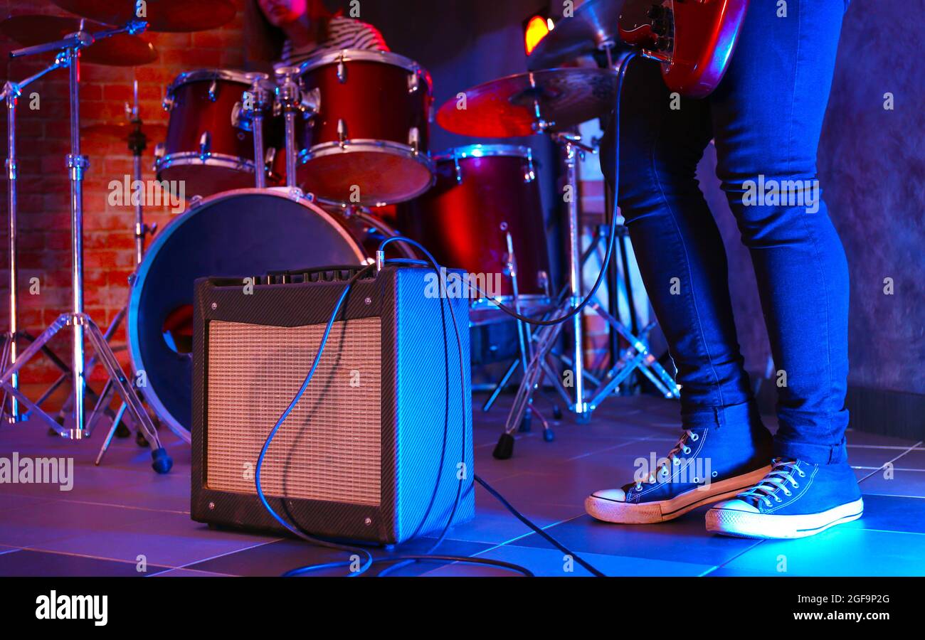 Feet of a guitar musician Stock Photo Alamy