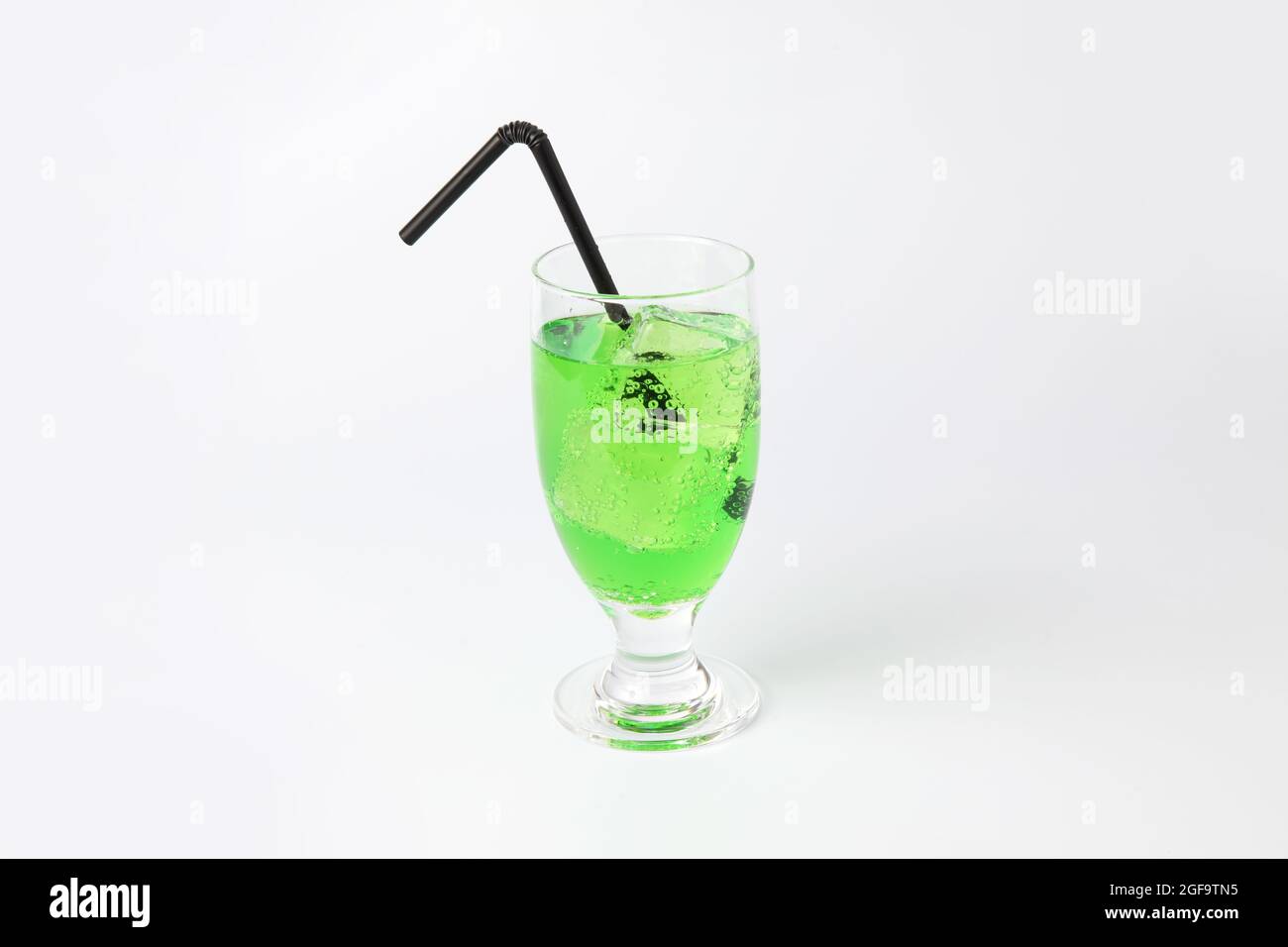 glass of cold melon soda drink isolated on white background Stock Photo