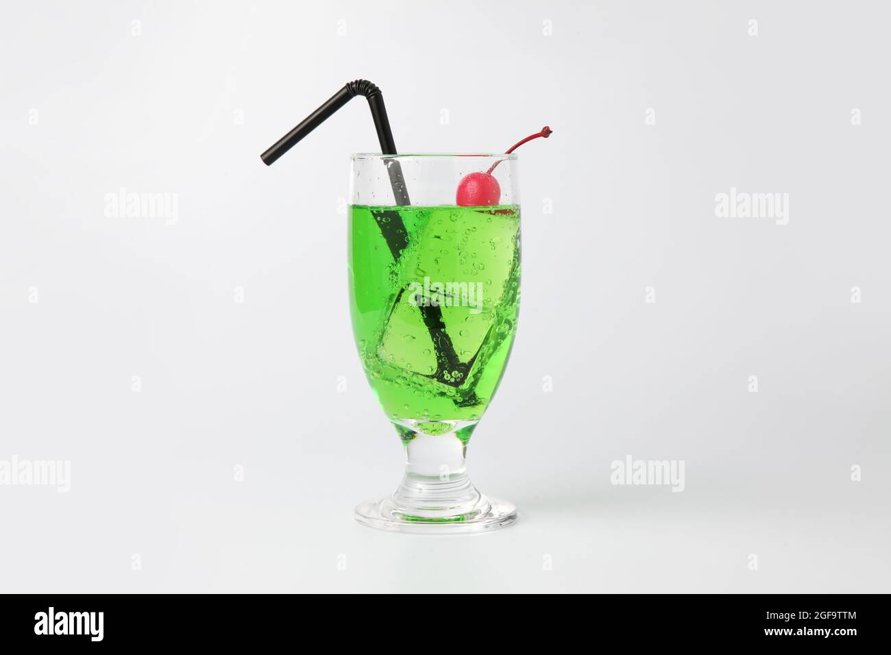 glass of cold melon soda drink isolated on white background Stock Photo