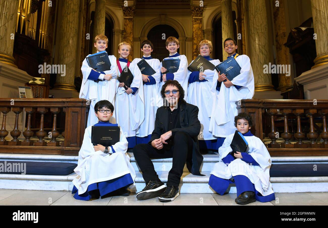 Tony Iommi former Black Sabbath guitarist with the cathedral choir at St Philip's Cathedral, Birmingham. Stock Photo