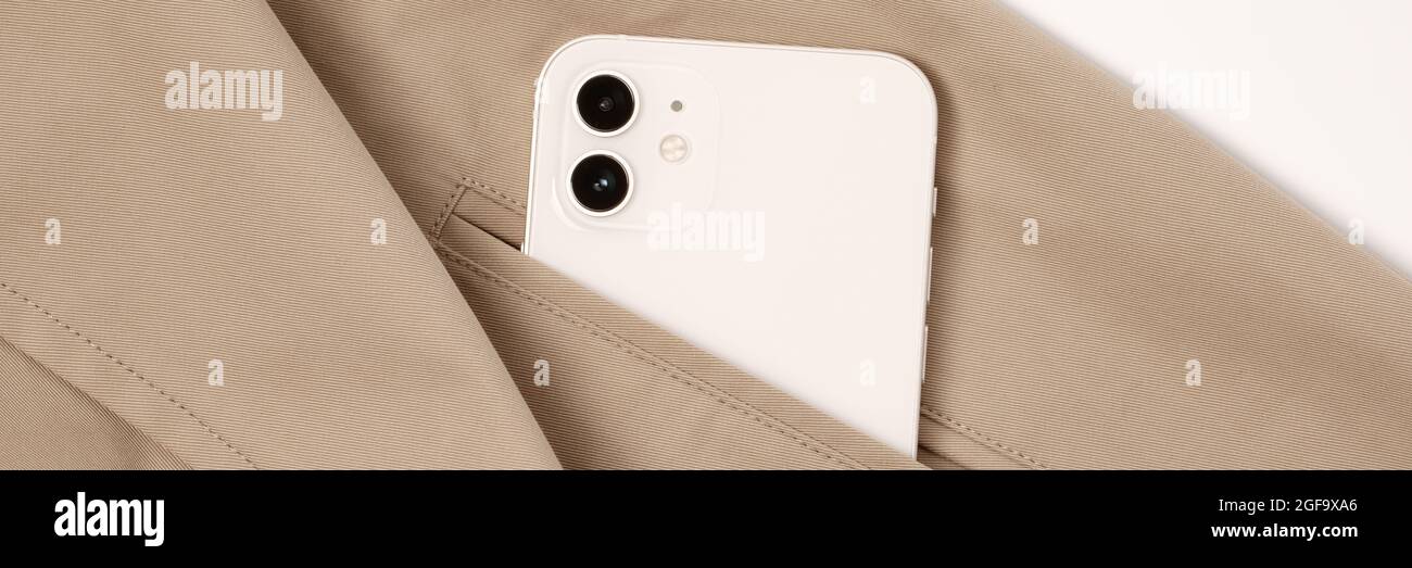 Beige trench coat hi-res stock photography and images - Alamy