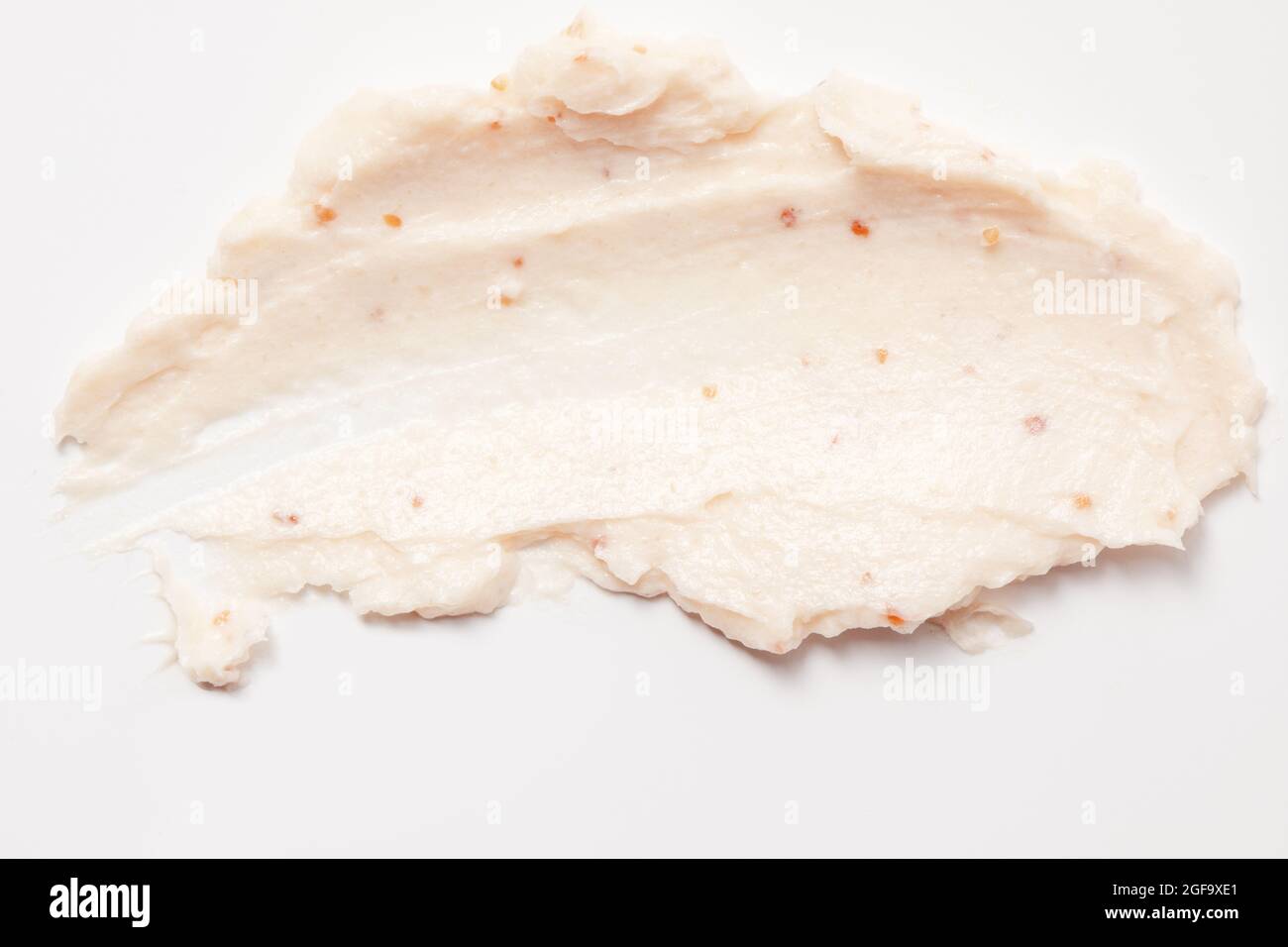 Face cream scrub texture background. Exfoliating skin care product swatch  smear smudge. Gentle creamy scrub cleanser sample close up Stock Photo -  Alamy