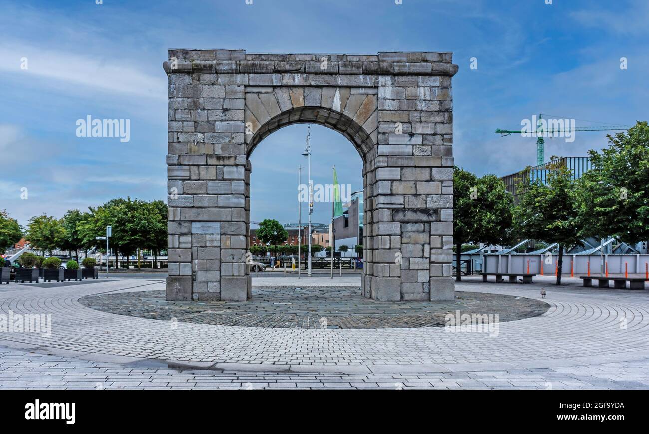 The Triumphal Arch on Custom House Quay, opposite the Epic Museum, in Dublin, Ireland. Built in 1813. It  is constructed of ashlar limestone. Stock Photo
