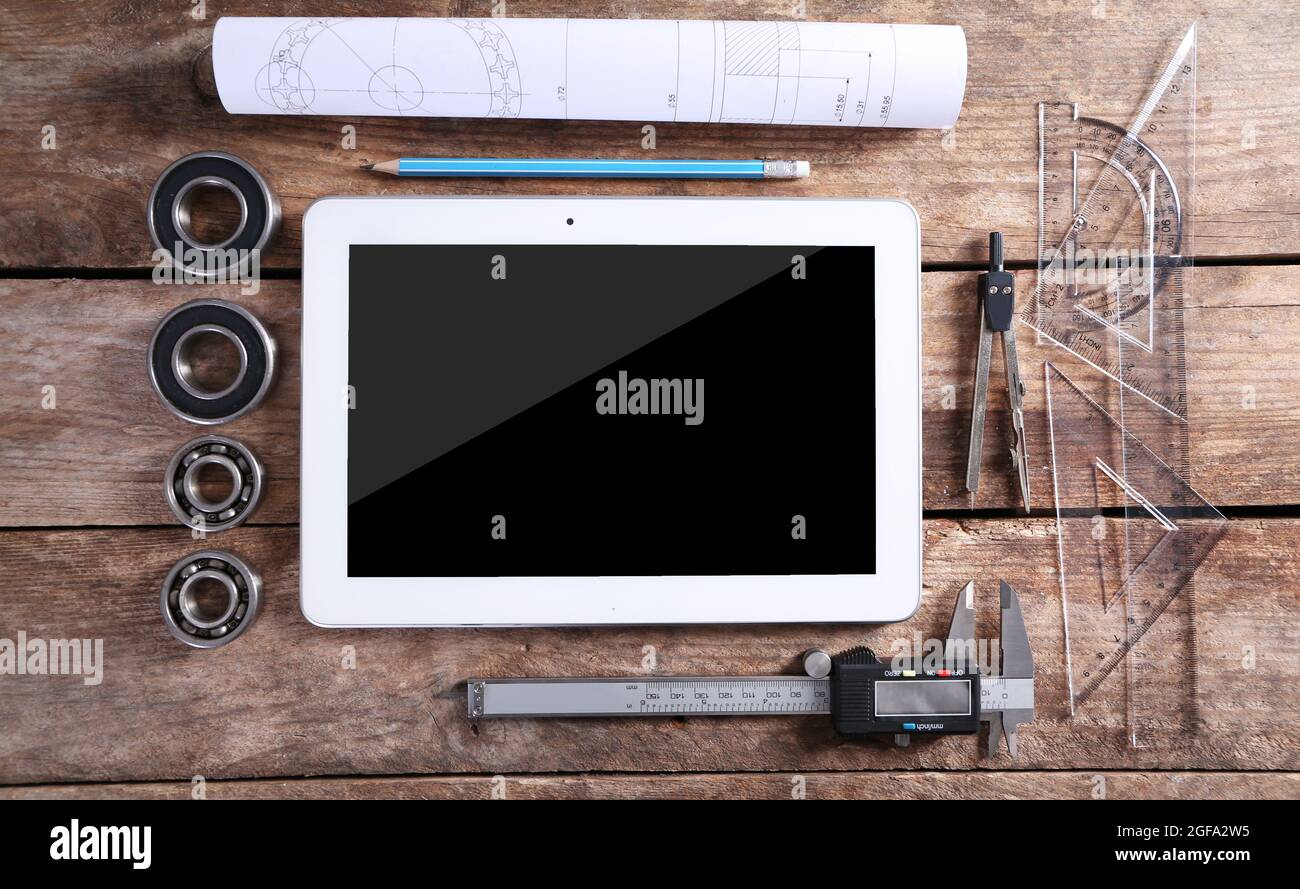 Engineering drawing with tools and tablet, top view Stock Photo Alamy