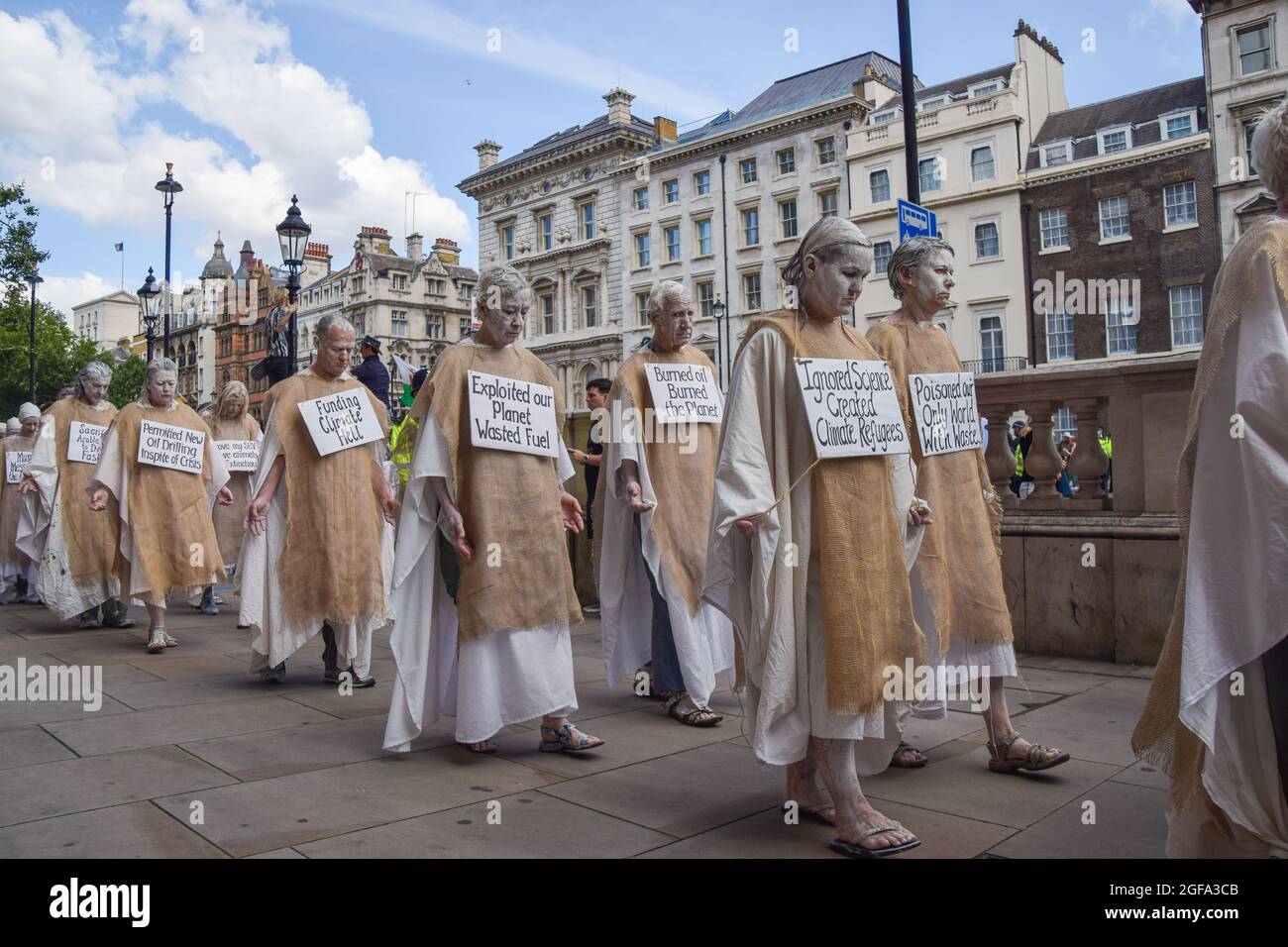 The Penitents Performance Troupe. Sackcloth and Ashes, Extinction  Rebellion Climate Change Protest, Westminster, London. UK Stock Photo -  Alamy