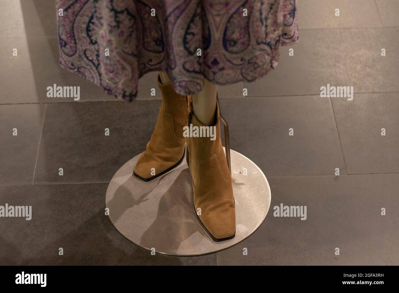 a mannequin with brown boots. Fashion concept Stock Photo Alamy
