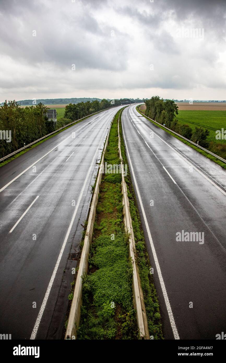 Highway A61 in the rain, no cars because closed of flood damage Stock Photo